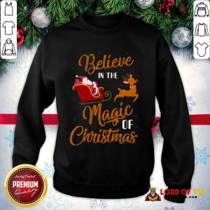 Nice Believe In The Magic Of Christmas Santa Claus Riding Reindeer SweatShirt