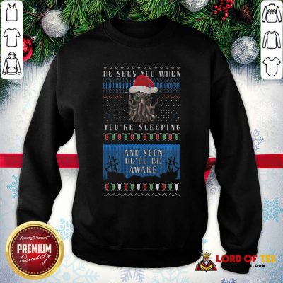  He Sees You When You’re Sleeping And Soon He’ll Be Awake Christmas SweatShirt - Design By Lordoftee.com