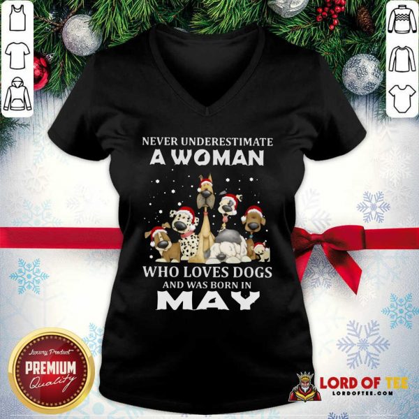 Never Underestimate A Woman Who Loves Dogs And Was Born In May Christmas V-neck-Design By Lordoftee.com