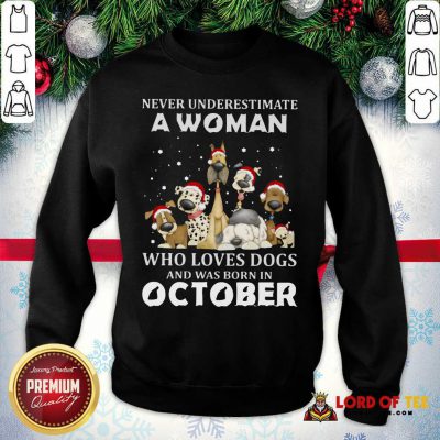 Never Underestimate A Woman Who Loves Dogs And Was Born In October Christmas Sweatshirt-Design By Lordoftee.com 