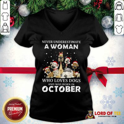 Never Underestimate A Woman Who Loves Dogs And Was Born In October Christmas V-neck-Design By Lordoftee.com 